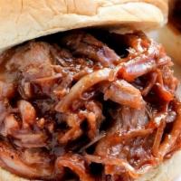 1/4 Lb Pulled Pork Slider · In-house smoked pulled pork, BBQ sauce on a Martin potato roll