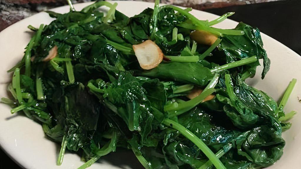 Kale · garlic sauteed, EVOO
