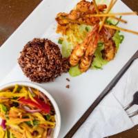 Sp15. Grilled Jumbo Shrimp (Thai Style) · Spicy. Grilled marinated jumbo shrimp with Thai chili paste served with mango salad and stic...