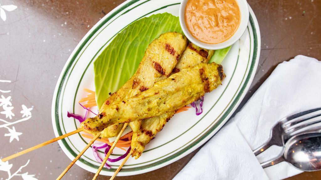 Grilled Chicken Or Beef Satay · Grilled marinated chicken or beef on skewers served with peanut sauce and cucumber relish. Comes with grilled slice bread.