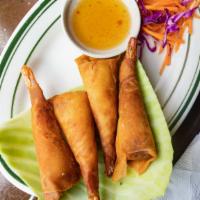 Crispy Shrimp Roll · Whole shrimp wrapped with spring wrapper served with sweet chili sauce.