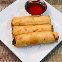 Crispy Spring Rolls · Deep-fried mixed vegetables roll with plum sauce.