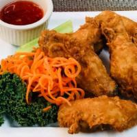 Thai Chicken Wings · Deep fired chicken wings coated with a little sweet, spicy, tangy, and savory
