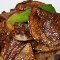 Spicy Potatoes · Hot and spicy. Sautéed fried sliced red potato with scallion in spicy fresh chili sauce.