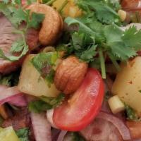Roasted Duck Salad · Hot and spicy. With romaine, tomato, pineapple, cashew nuts.