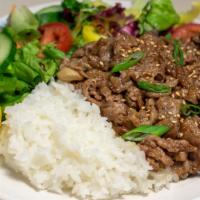 Bulgogi Bowl · Thinly sliced marinated beef or pork over rice, diced cabbage & pickled onions.