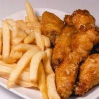 Soy Garlic Chicken Wings · Fried wings tossed in a Soy Garlic glaze. Served with fries.