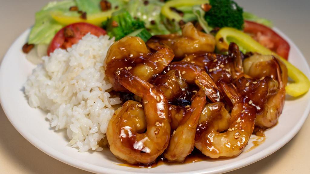Shrimp Bowl · Pan seared shrimp sautéed in Teriyaki or Spicy Gochujang sauce. Served over rice, diced cabbage and pickled onions.