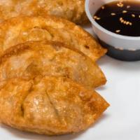 Dumplings · Fried Dumplings with your choice of Beef or Veggie filling. Comes with our homemade dumpling...