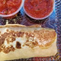Breakfast Burrito · With two scrambled eggs, guacamole, salsa and cheddar cheese in a soft tortilla. Served with...