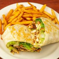 Tender Chicken Wrap · Grilled tender chicken with avocado, plum tomatoes, mixed greens and herb dressing. Wrapped ...