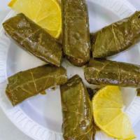 Grape Leaves · Stuffed grape leaves with rice, tomatoes, and parsley