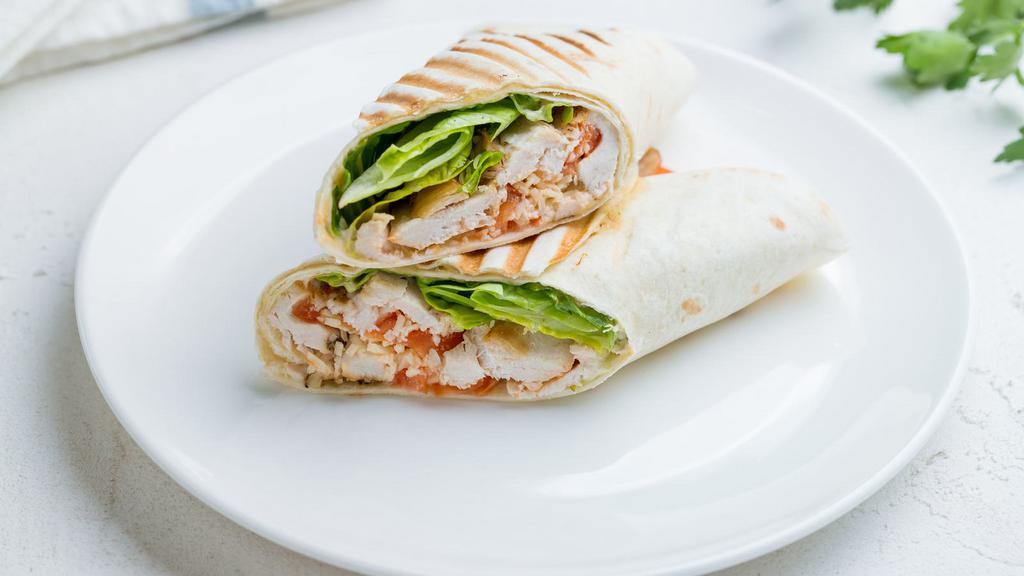 Caesar Grilled Chicken Wrap · Wrapped filled with grilled chicken, feta cheese, spinach, and Caesar dressing.