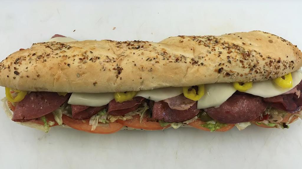 Uncle Vinny'S Grilled Italian Sub - Family Favorite!! · Customer Favorite: A large Fresh Baked Sub Roll lightly grilled layered with Ham, Genoa Salami, and Hot Capicola with your choice of toppings and melted Cheese. I personally love this one with Grilled Hot peppers.