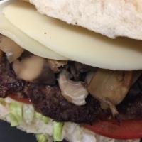 Mushroom Cheeseburger - Family Favorite!! · Grilled Angus Burger with fresh mushrooms.