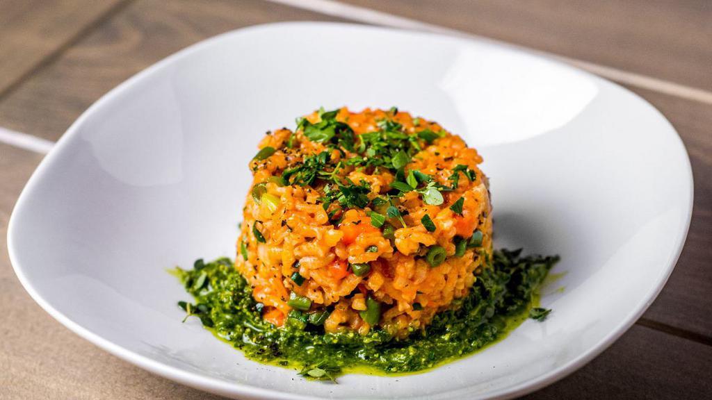 Carrot Risotto · Vata, Pitta (V, GF) Creamy with a crunch, with delicate flavors. Arborio rice, fresh carrot juice, celery, green beans, basil-parsley pesto (walnuts), and sautéed leafy greens.