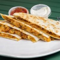 Detox Quesadilla · Fresh shrimps, grilled onions, mixed peppers, broccoli, spinach, mozzarella, and Cheddar che...
