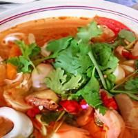 Spicy Seafood Soup Bowl · Shrimp, fish, mussel, squid,imitation crab, onion, thai basil, cilantro and mushrooms simmer...