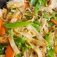 Chow Fun Tofu · Wide rice noodles with steamed tofu, broccoli, carrot, bean sprouts, green onion pan fried i...