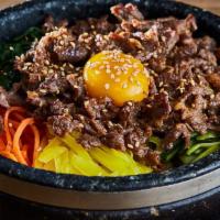 Bibimbap - Bulgogi (Beef) · Pan Fried Bulgogi on top / Steamed Rice served with Cooked vegetables (Carrot, Spinach, Zucc...