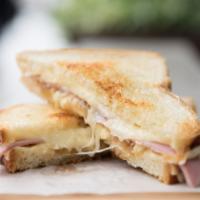 Ham And Cheese Grilled Cheese · Gruyere cheese, Levain Pullman bread, caramelized onions, ham and Dijon mustard.