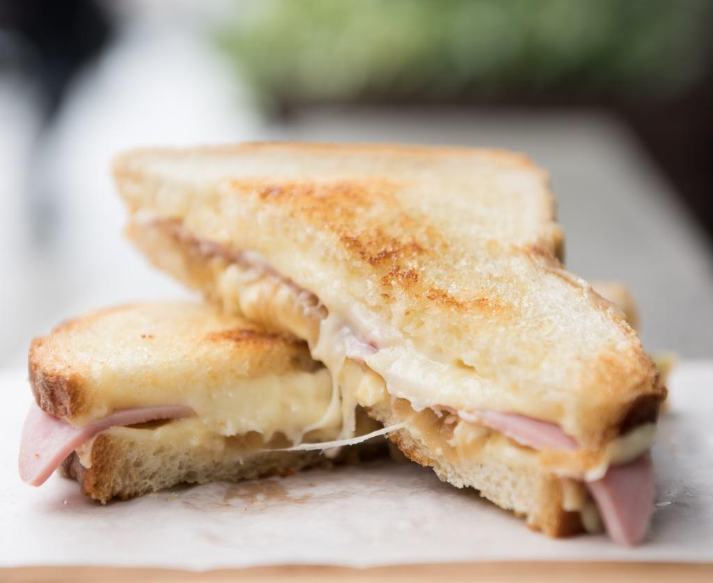 Ham And Cheese · Country Ham, Gruyere, Caramelized onions and Dijon Mustard on Levain Pullman