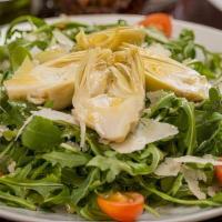 Large Arugula Salad · Cherry tomatoes, grana padana, artichoke hearts, lemon vinaigrette.