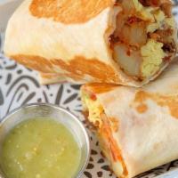 Shop Burrito · 2 folded eggs, home fries, avocado, sour cream, flour tortilla, salsa verde