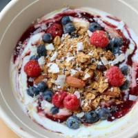 Muesli · Peach & lemon compote, yogurt, granola, fruit, coconut flakes