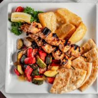 Chicken Souvlaki Platter · Double portion of meat served with one side dish, pita bread and tzatziki.