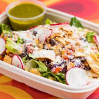 Chopped Salad · Green leaf lettuce, avocado, radish, cotija cheese, corn & black bean salsa, tortilla chips,...