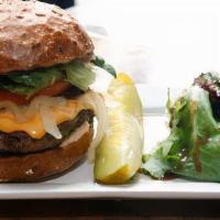 Pure · 8oz beef burger with American cheese, turkey bacon, lettuce, tomato, sauteed onions, topped ...