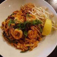 Pad Thai · Stir-fried thin rice noodles with egg, bean curd, bean sprout, scallion, sweet radish, crust...