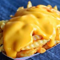 Cheese Fries · Crinkle cut fries smothered in melted Cheddar cheese.