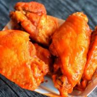 Buffalo Wings · Buttery buffalo sauce flavored wings.