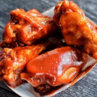Bbq Wings Wet Rub · Wings doused in BBQ sauce.