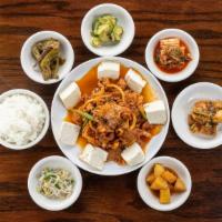 Dubu Jaeyuk Kimchi · Spicy stir-fried pork with  vegetables, tofu and kimchi. comes with a rice.