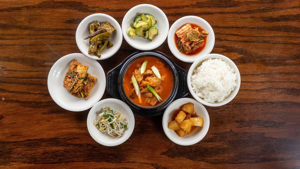 Kimchi Jjigae · kimchi and pork stew. comes with a rice.