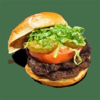 Signature Burger · Our signature double-stack burger cooked to order with pickles, lettuce, tomato, and ketchup...