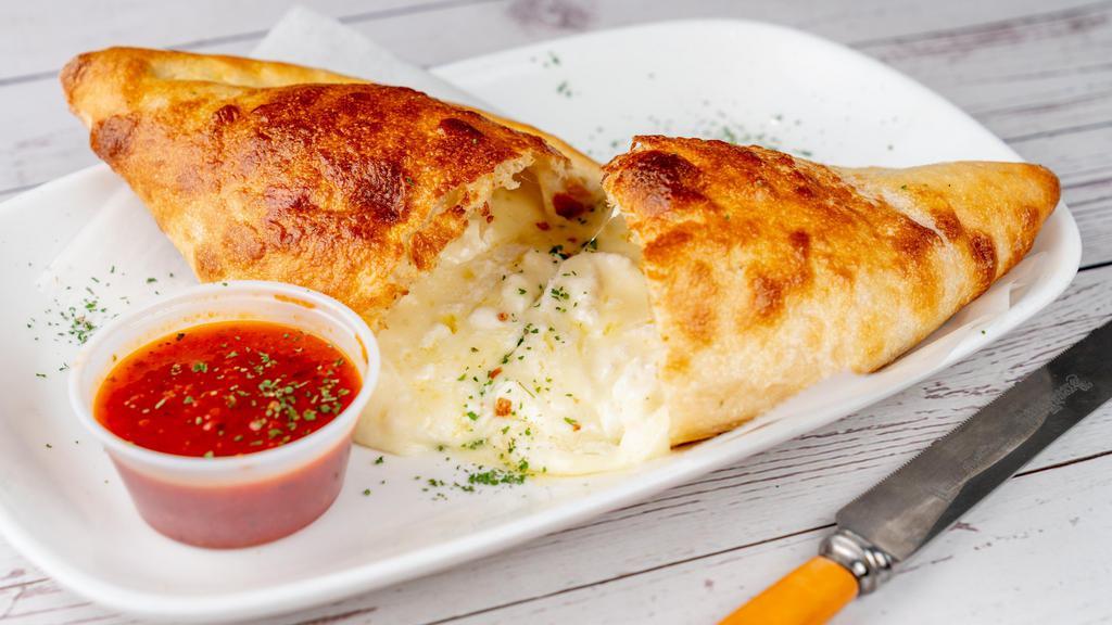 Cheese Calzone · Filled with ricotta and mozzarella cheese.