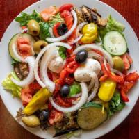 Grilled Vegetable Salad · With eggplant, roasted red peppers & fresh mozzarella cheese on a bed of greens with tomatoe...