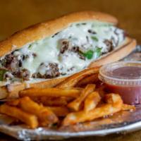 Make It A Cheesesteak Combo · Served with Cajun french fries.