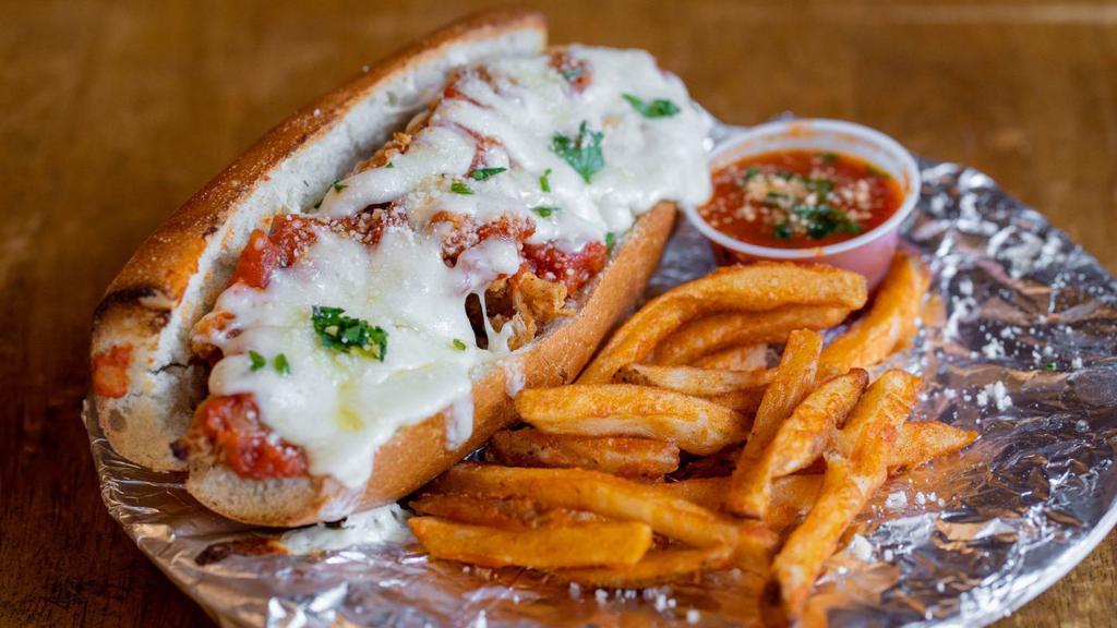 Chicken Parmesan Hero · Baked with melted mozzarella cheese in an Italian hero bread. Served with marinara sauce with melted mozzarella cheese.