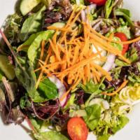 Classic House Salad · Mixed garden greens, onions, cucumber, carrots, confetti tomatoes, our white balsamic vinaig...