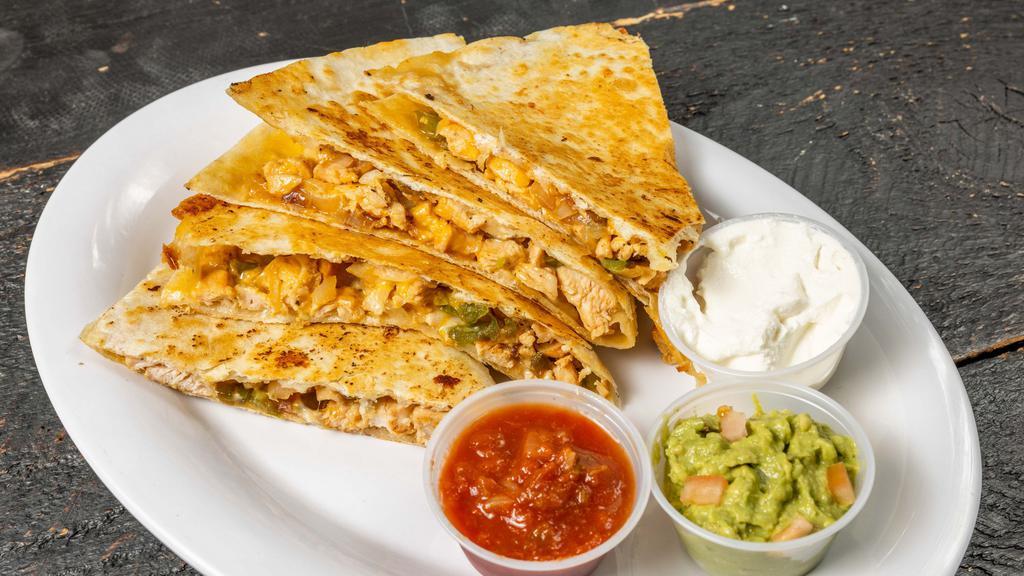 Cajun Chicken Quesadilla · With peppers and onions. Served w/guacamole, salsa & sour cream.