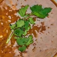 Lentil Soup · Flakes with sautéed onions, carrots and celery in a light tomato and lentil broth. Served wi...