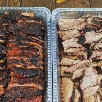 Boss Family Combo · 1/3 lb pulled pork, 1/3 lb pulled chicken, 1/3 lb brisket, 1/2 rack of ribs. Three family si...