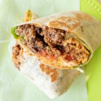 Meat Burrito · Flour or wheat Tortilla; stuffed with choice of protein, Rice, Beans, Muenster Cheese, lettu...
