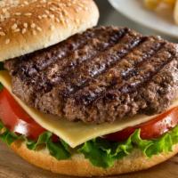 The Burger · Sizzling beef patty topped with lettuce, tomatoes, pickles and onions.