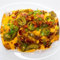 Loaded Tater Tots · Cheese, bacon, jalapenos.